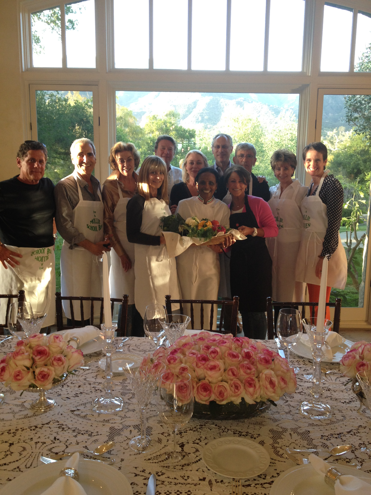 Private dining group with roses and elegant table setting