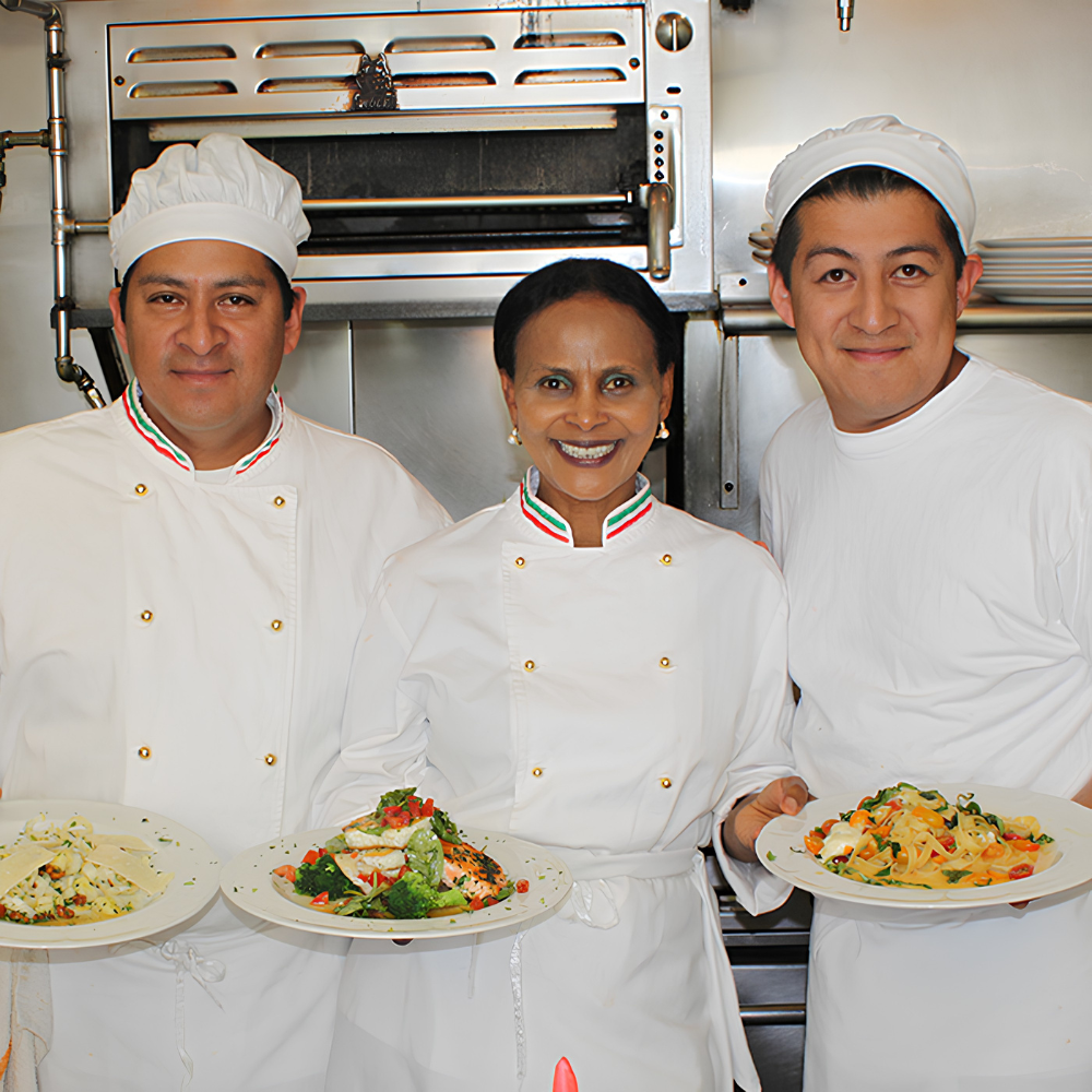 Chef Mollie with her kitchen team at Trattoria Mollie